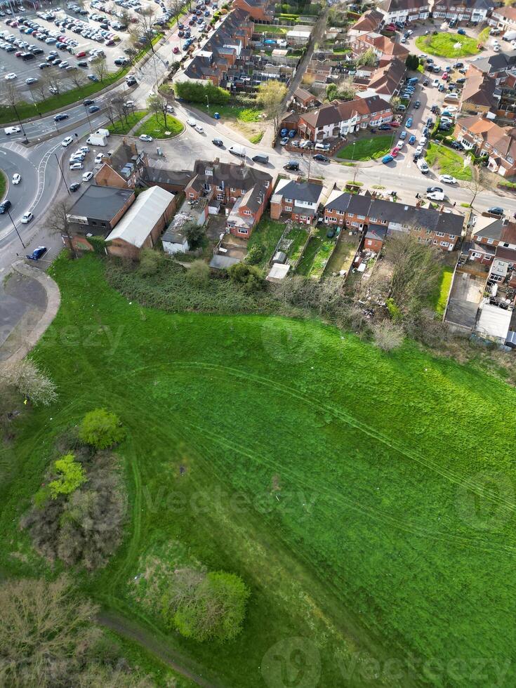 Aerial View of Residential District at Birmingham City of Midlands, England, United Kingdom. Drone Camera Footage was Captured from High Altitude During Sunset Time of March 30th, 2024. photo