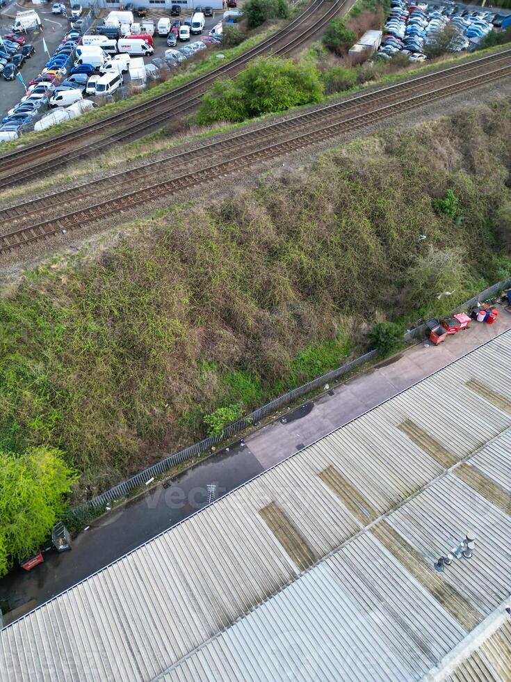 Aerial View of Residential District at Birmingham City of Midlands, England, United Kingdom. Drone Camera Footage was Captured from High Altitude During Sunset Time of March 30th, 2024. photo