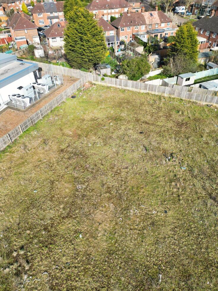 Aerial View of Residential District at Birmingham City of Midlands, England, United Kingdom. Drone Camera Footage was Captured from High Altitude During Sunset Time of March 30th, 2024. photo