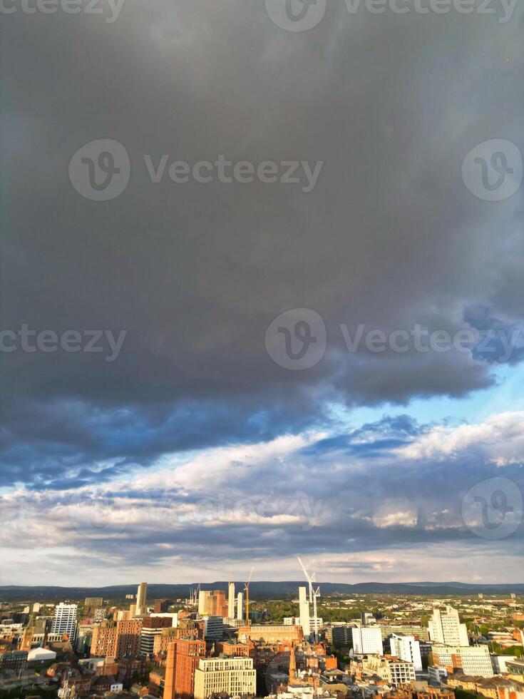 Iconic Buildings at Central Greater Manchester City Centre and Tall Buildings During Golden Hour of Sunset over England UK. Aerial Footage Was Captured with Drone's Camera on May 5th, 2024. photo