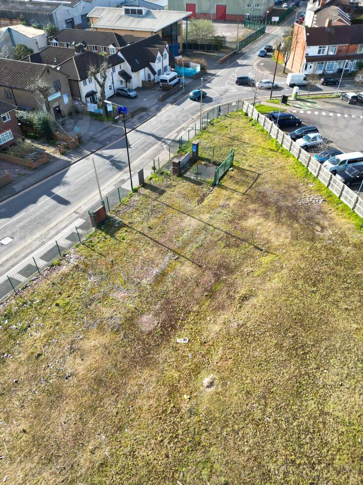 Aerial View of Residential District at Birmingham City of Midlands, England, United Kingdom. Drone Camera Footage was Captured from High Altitude During Sunset Time of March 30th, 2024. photo