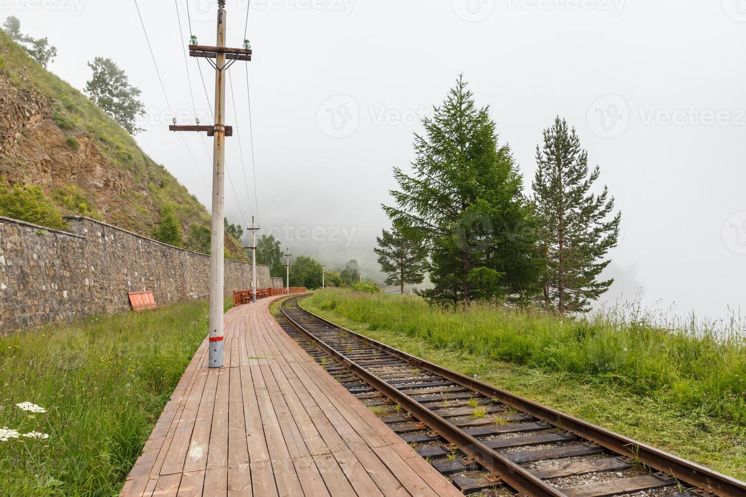 wooden platform. Stopping point at 102 km of the Circum-Baikal Railway. Lake Baikal, Russia photo
