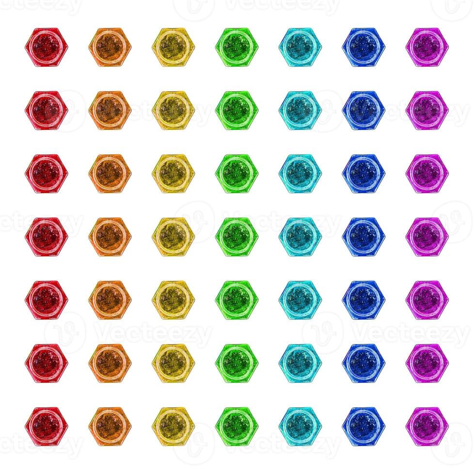 Top view of vibrant grid of 49 open rainbow colored hexagonal jars, showcasing organized symmetry, product variety, creative branding, and packaging displays. Isolated on white background photo