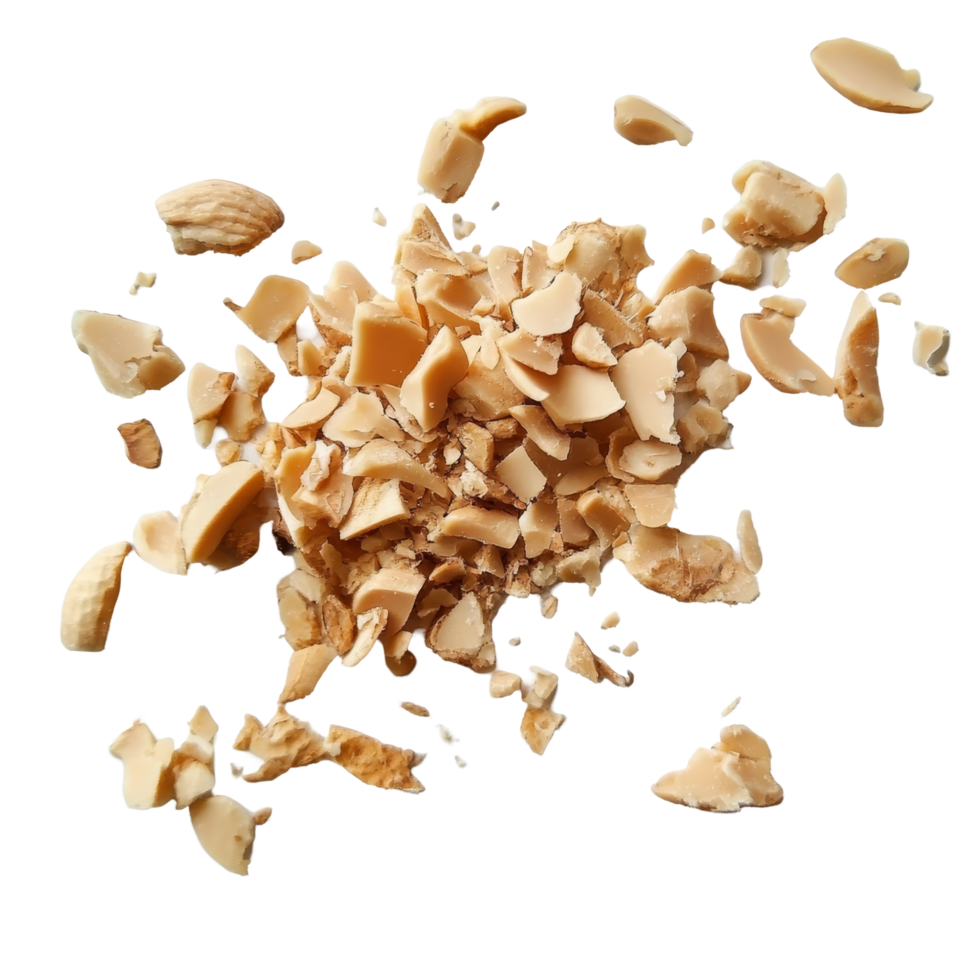 Crushed peanut pieces spread out on a transparent surface, showcasing their texture and color under natural light, Peanut crushed into pieces png