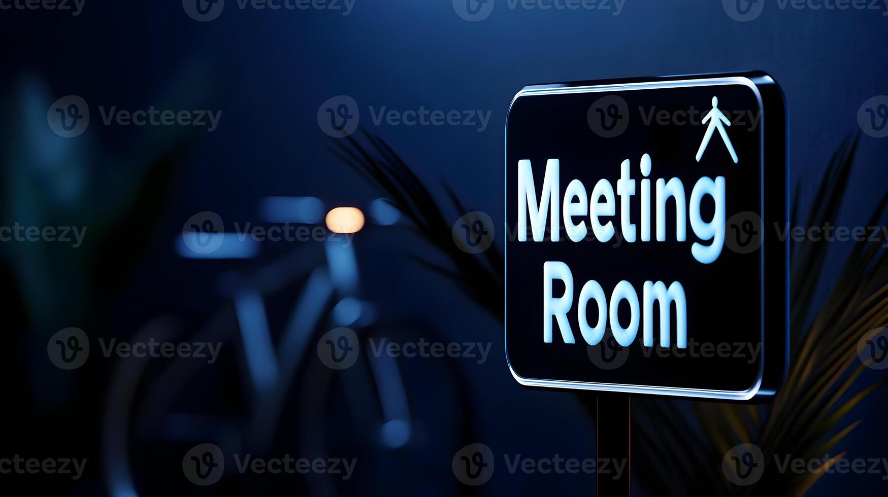 Meeting Room sign on office glass wall with empty collaboration workspace, large table, and armchairs in background. photo