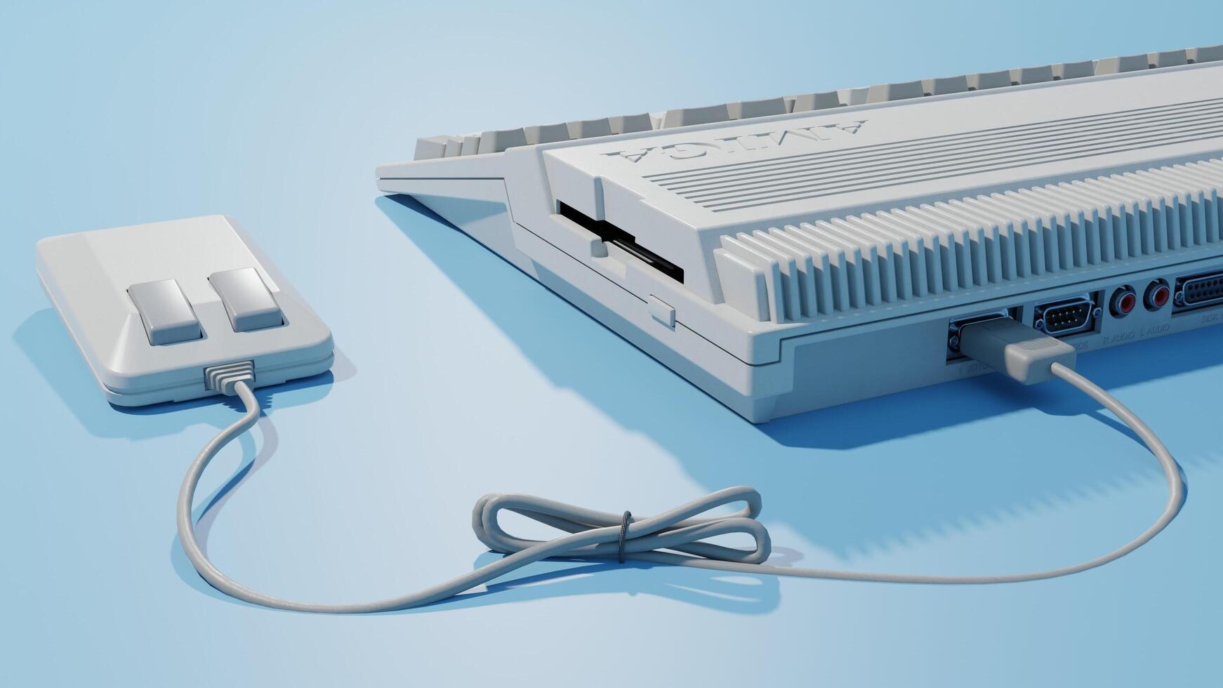 A white game console with a controller plugged in photo