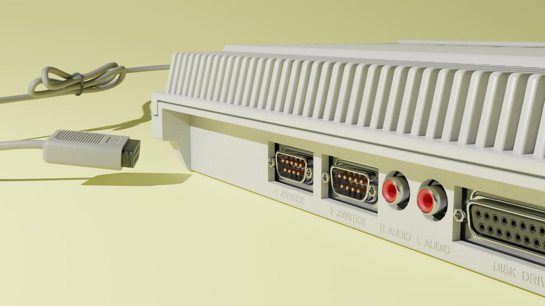 A white computer with a cord attached to it photo