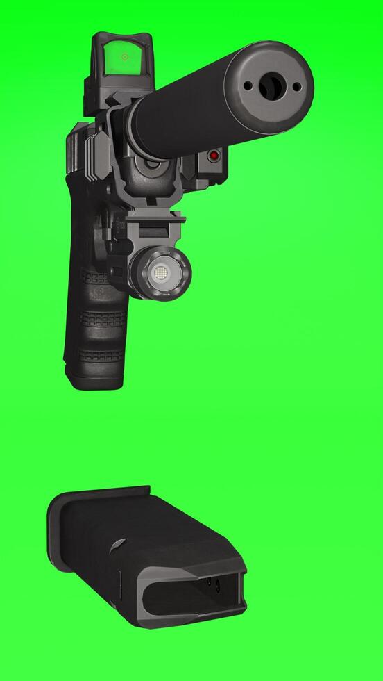 A gun and a flashlight on a green background photo