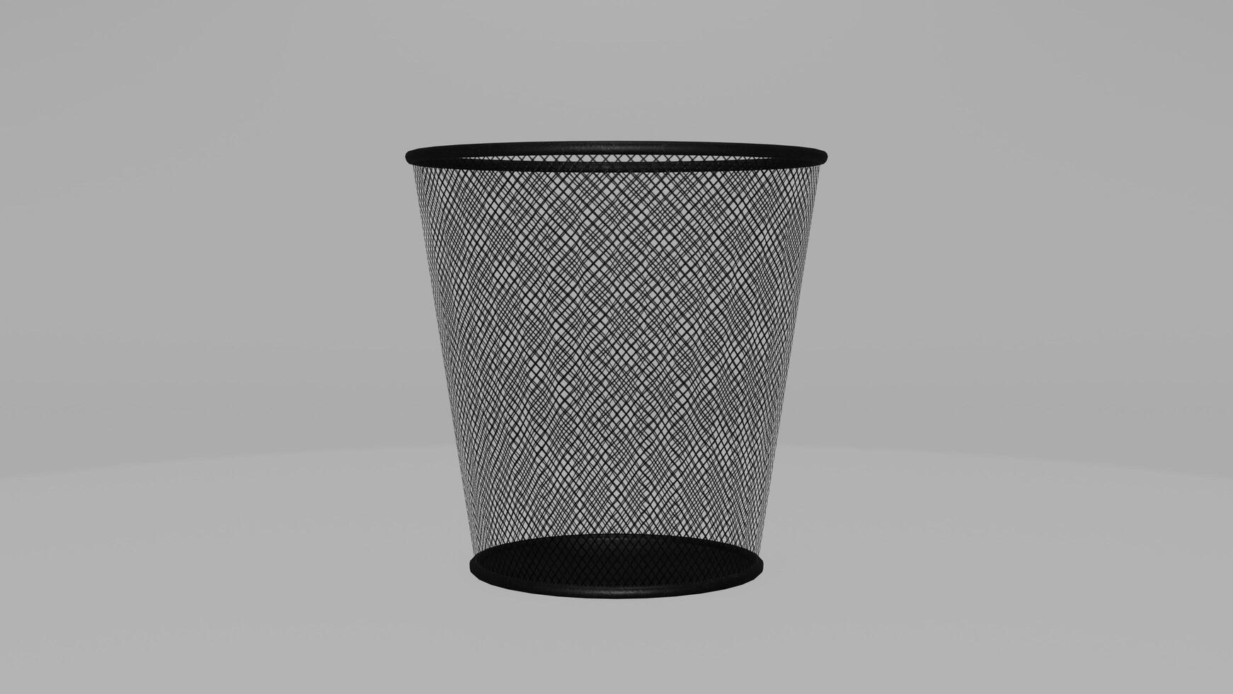 A black trash can with mesh netting on it photo