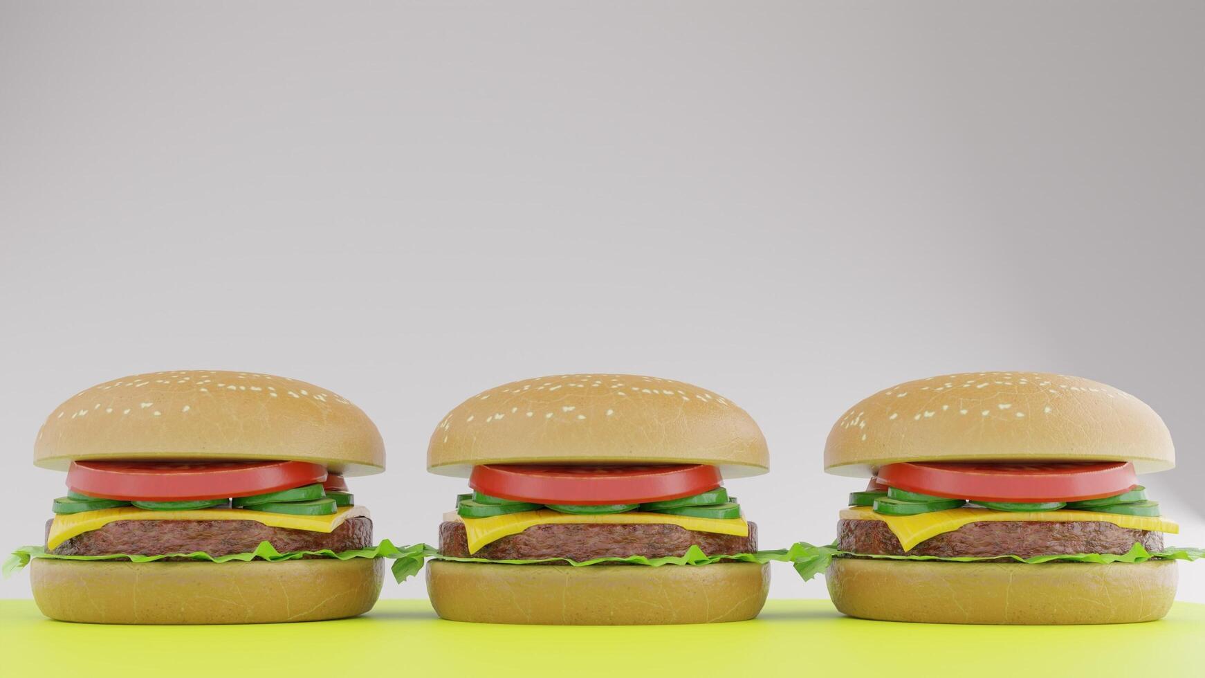Three hamburgers on a yellow background photo