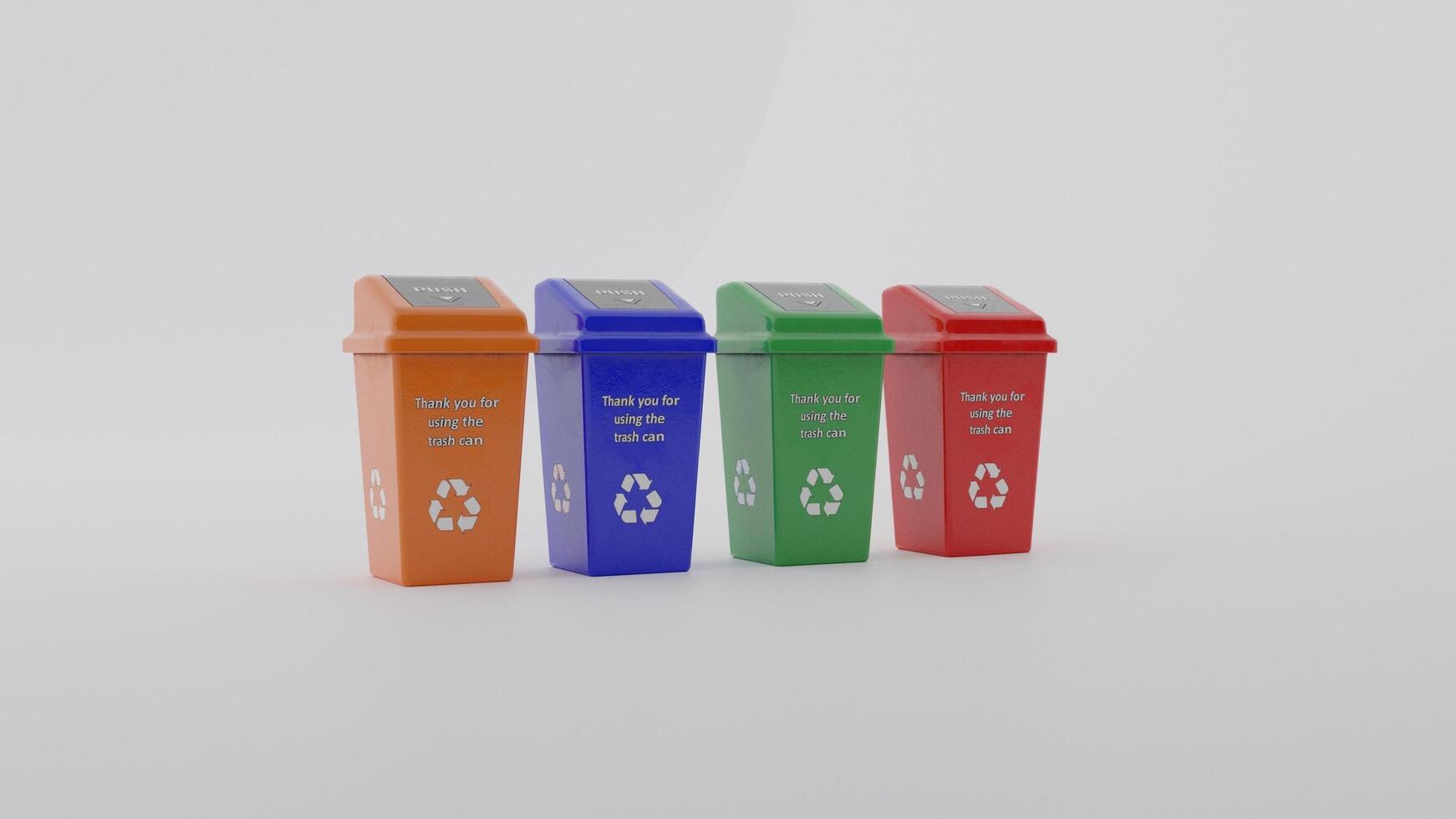 Three colorful trash cans with the words recycle on them photo
