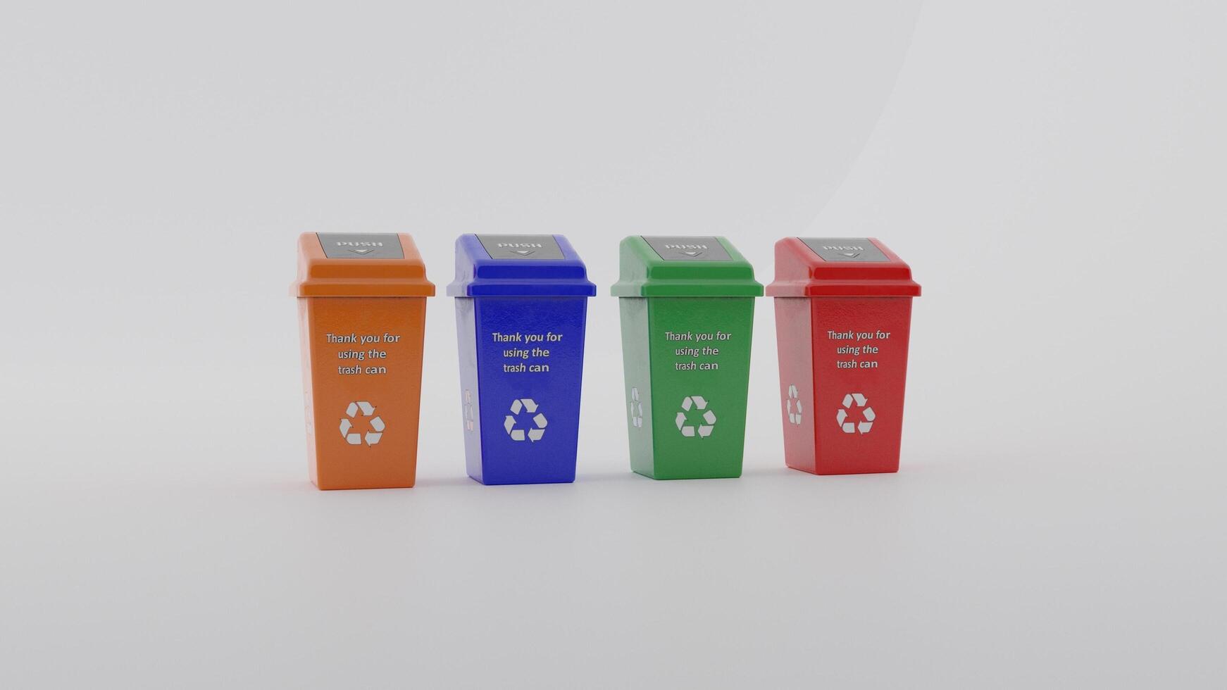 Three colorful trash cans with the words recycle on them photo
