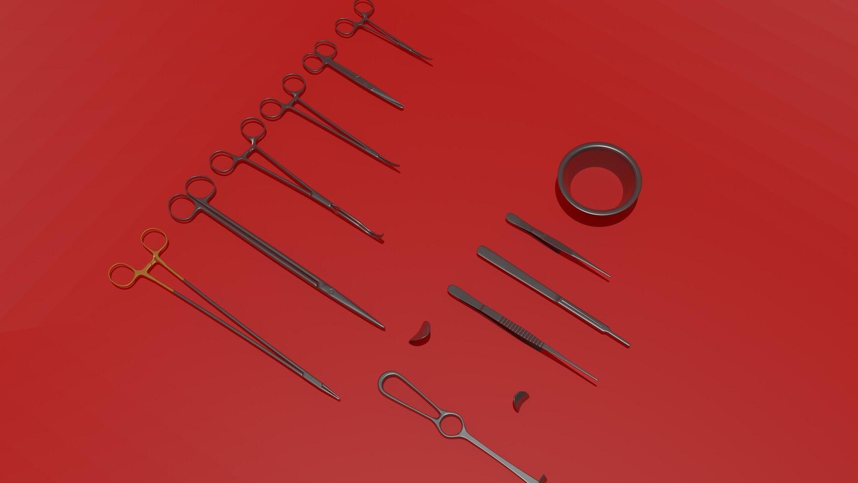 A set of surgical instruments on a red surface photo