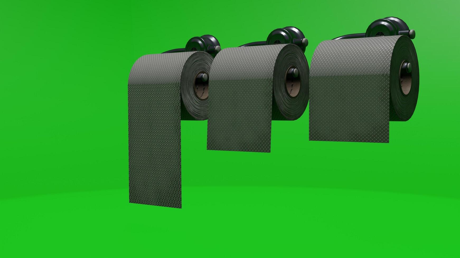 Three rolls of toilet paper on a green background photo