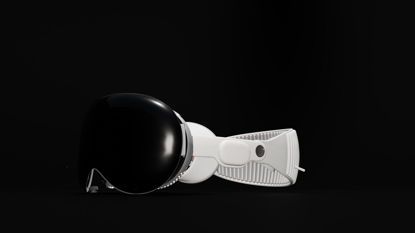 A black and white ski goggles on a black background photo
