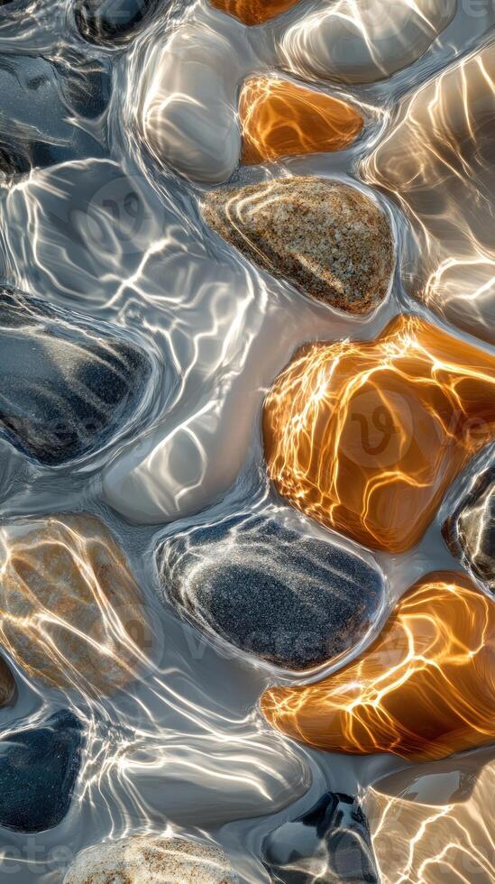 Abstract Riverbed with Sunlit Stones and Ripples photo