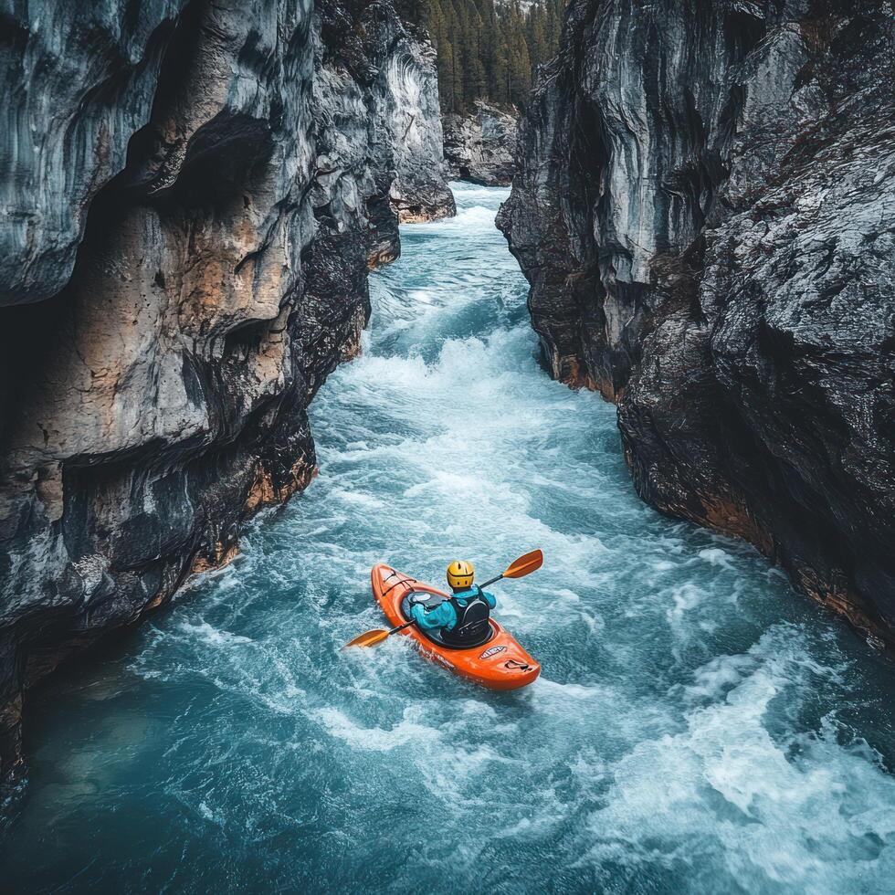 Kayaker Navigating a Narrow Canyon Gorge with Rushing Water photo