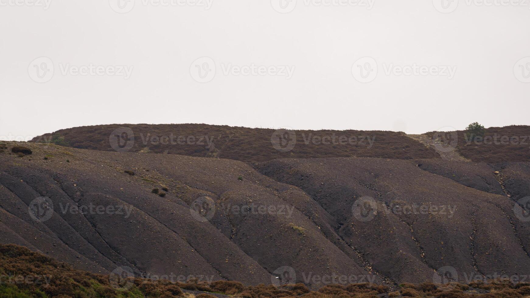 Serene Mountain Silhouette in a Vast Wilderness Landscape photo
