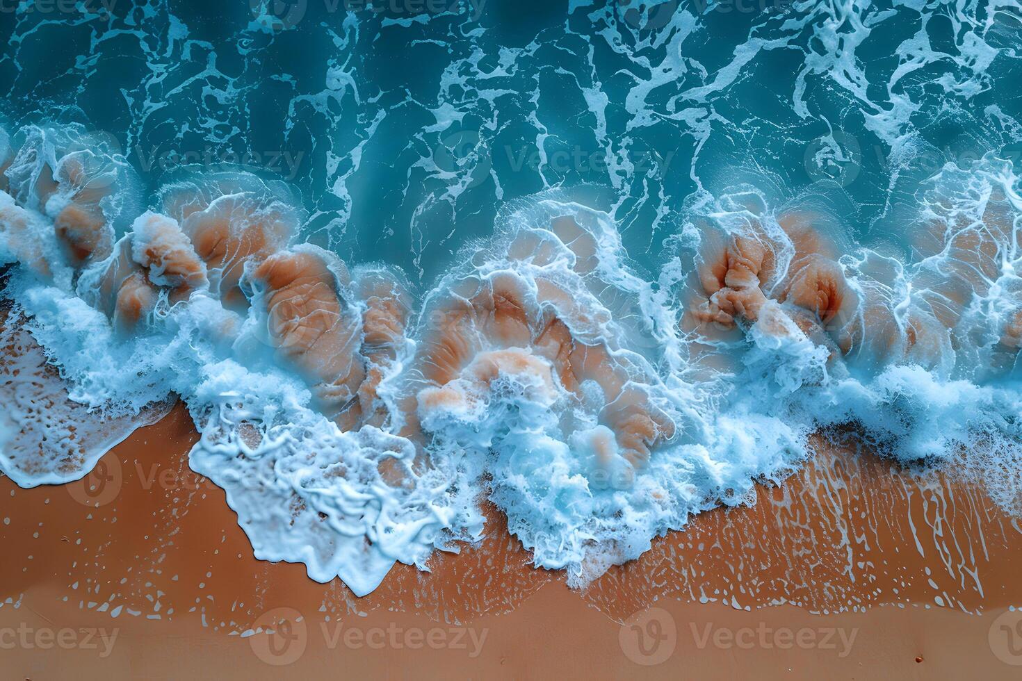 Aerial View of Ocean Waves Crashing on Sandy Beach - Coastal Serenity photo