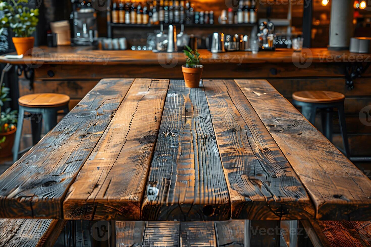 Rustic Wooden Table in Cozy Cafe Setting with Warm Ambiance for Relaxation and Dining photo