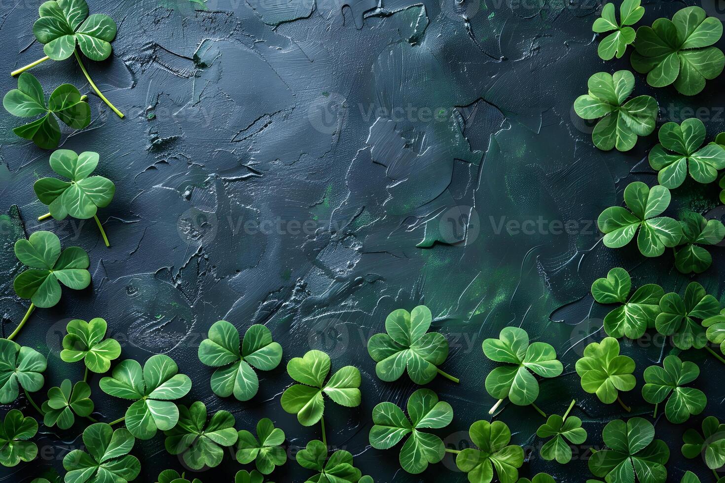 St. Patrick's Day Concept with Clover Leaves on Textured Dark Green Background photo