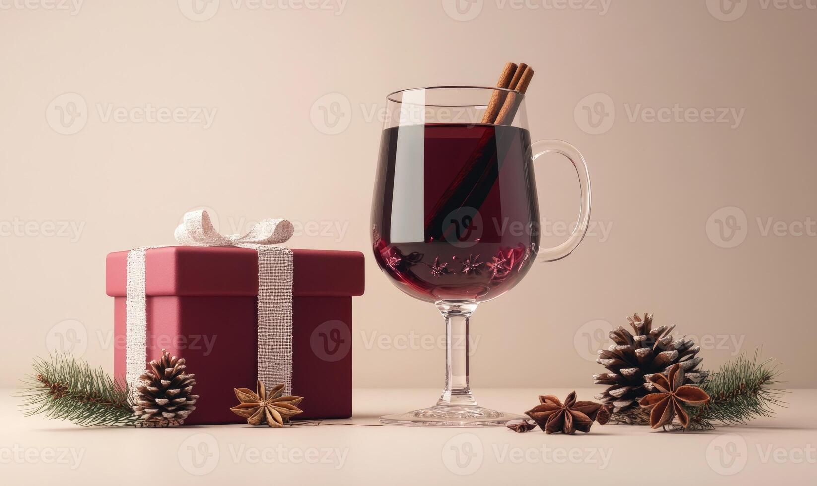 A red box with a ribbon sits next to a wine glass filled with red liquid photo