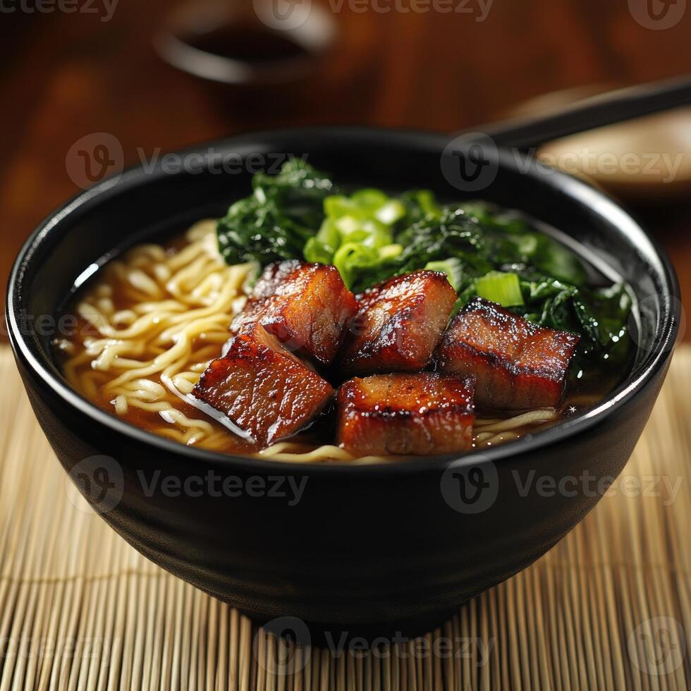 A bowl of soup with meat and vegetables in it photo
