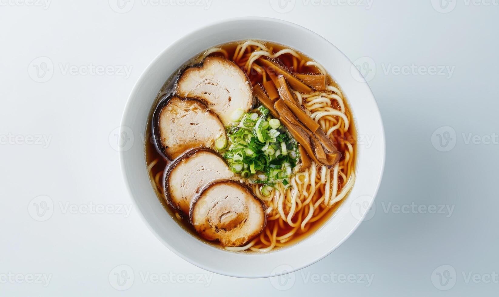A bowl of ramen with meat and vegetables photo