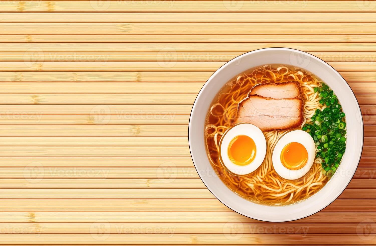 A bowl of ramen with eggs and meat in it sits on a wooden table photo