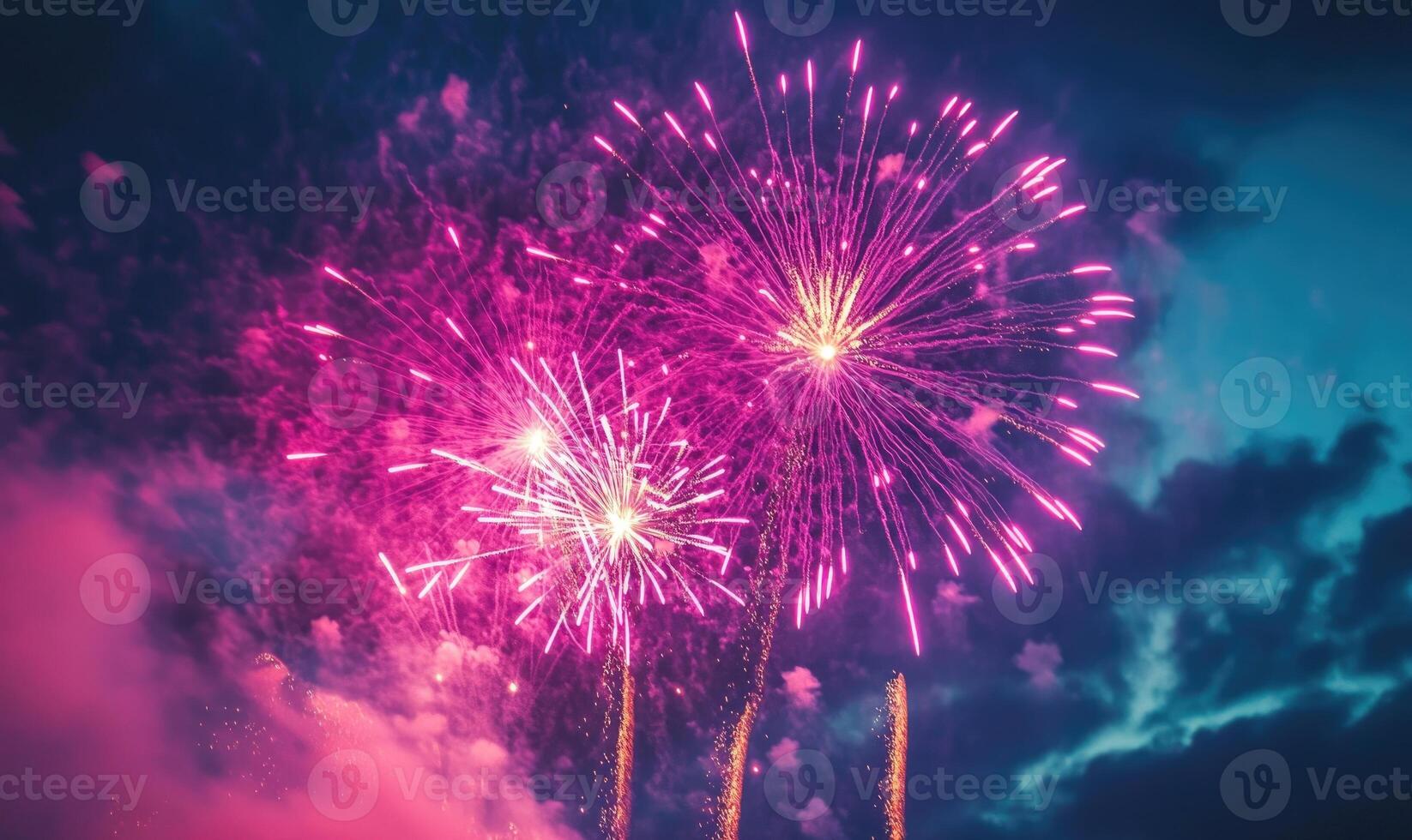 A fireworks display in the sky with three fireworks in the middle photo