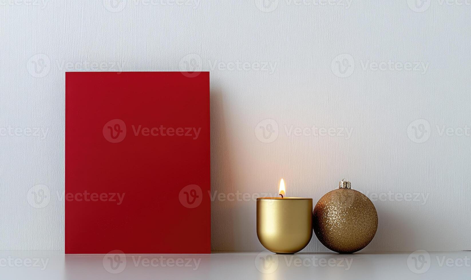A red frame with a candle and a gold ball on a white background photo