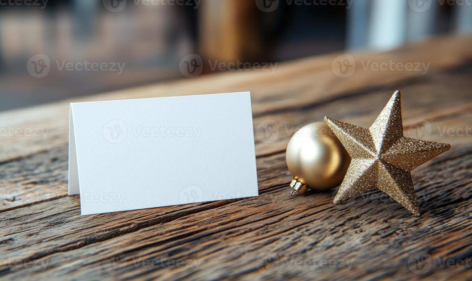 A white card with a star on it sits on a wooden table photo