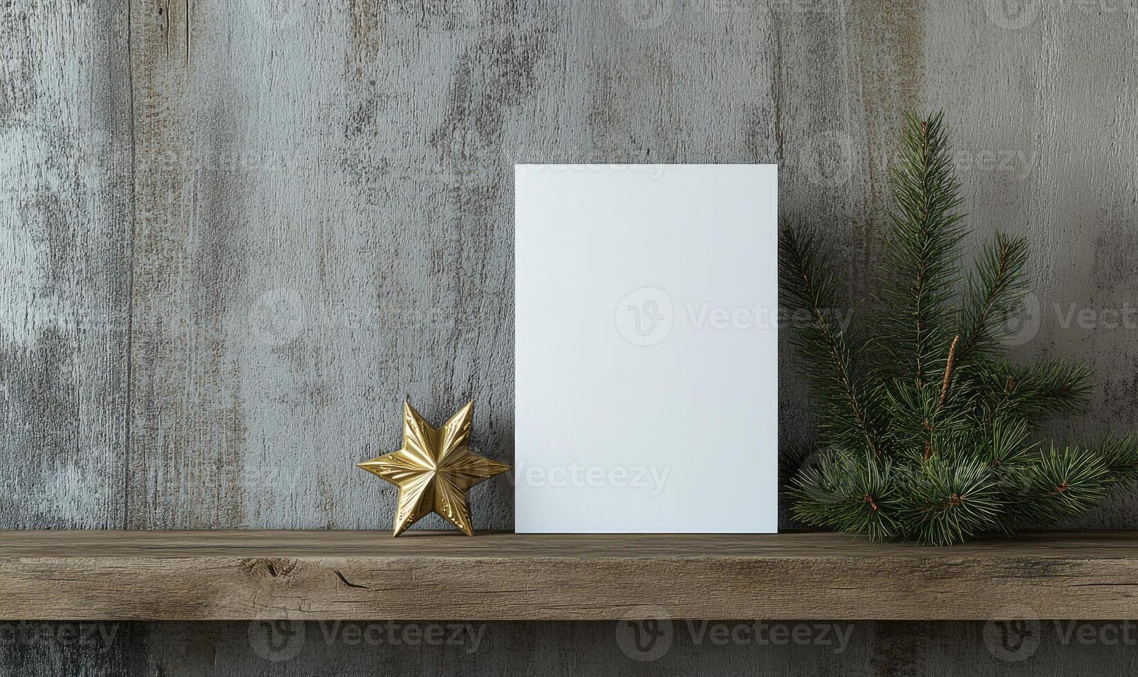 A white frame sits on a shelf next to a gold star and a pine tree photo