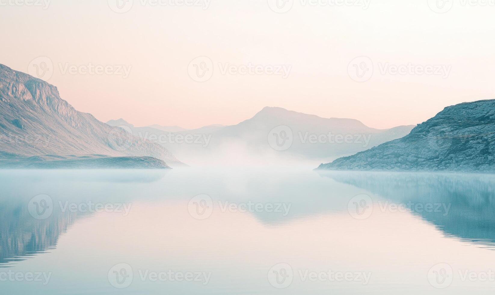 A mountain range is reflected in the water photo