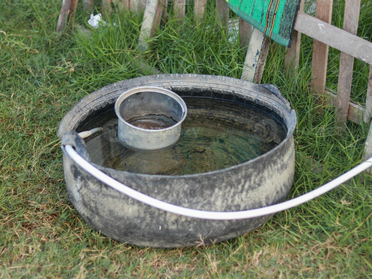 water container made from used tires photo