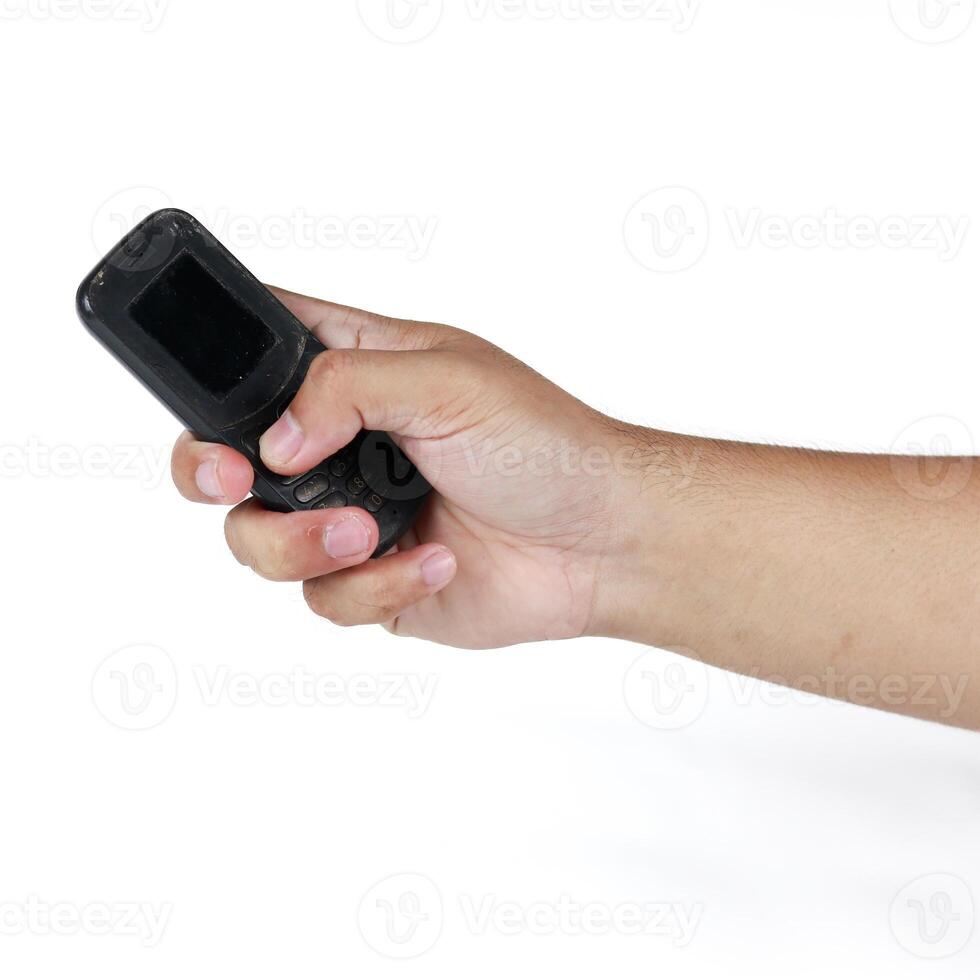 Hand holding mobile phone isolated on white background, clipping path included. photo