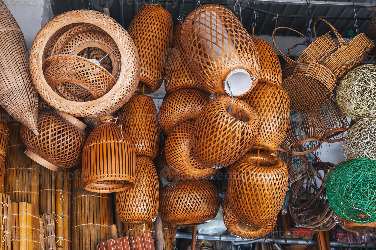 A traditional market in Vietnam with goods made of rattan, bamboo and palm leaves. photo