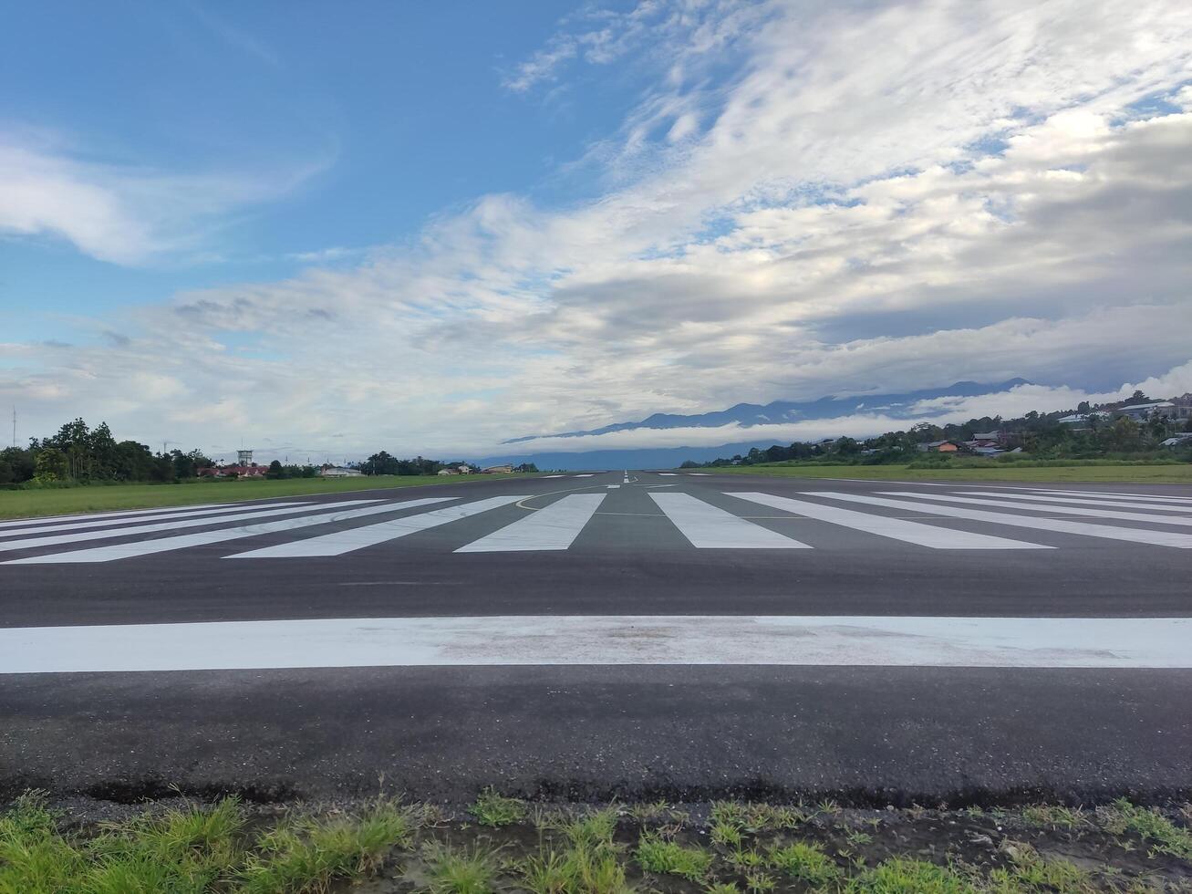 airplane runway and clear blue sky photo