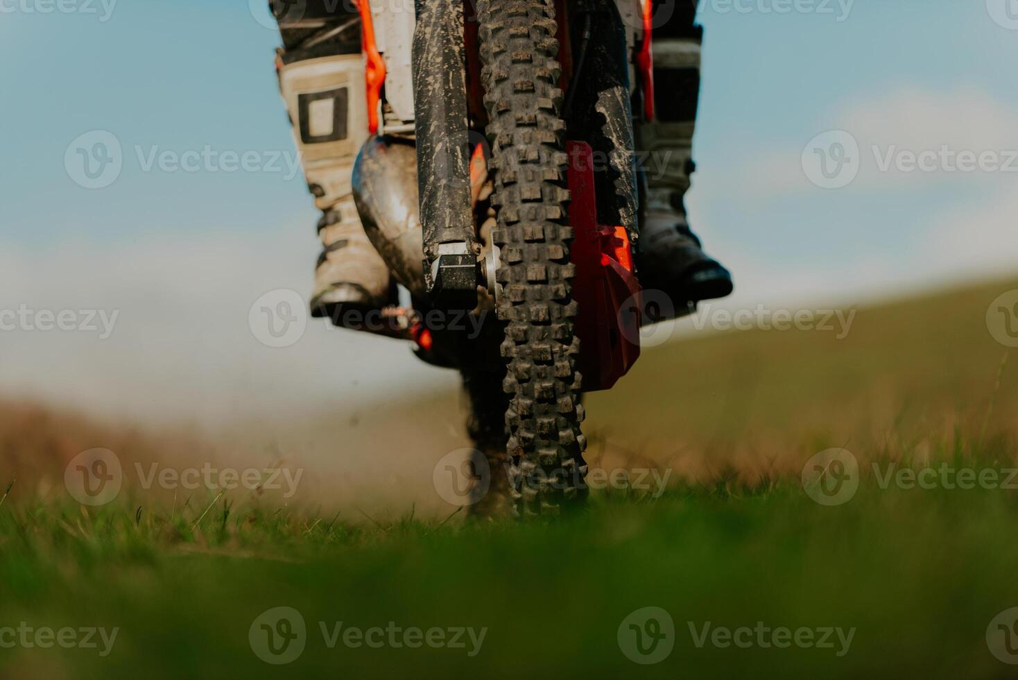 Professional enduro bike rider on action. Motocross sport. photo