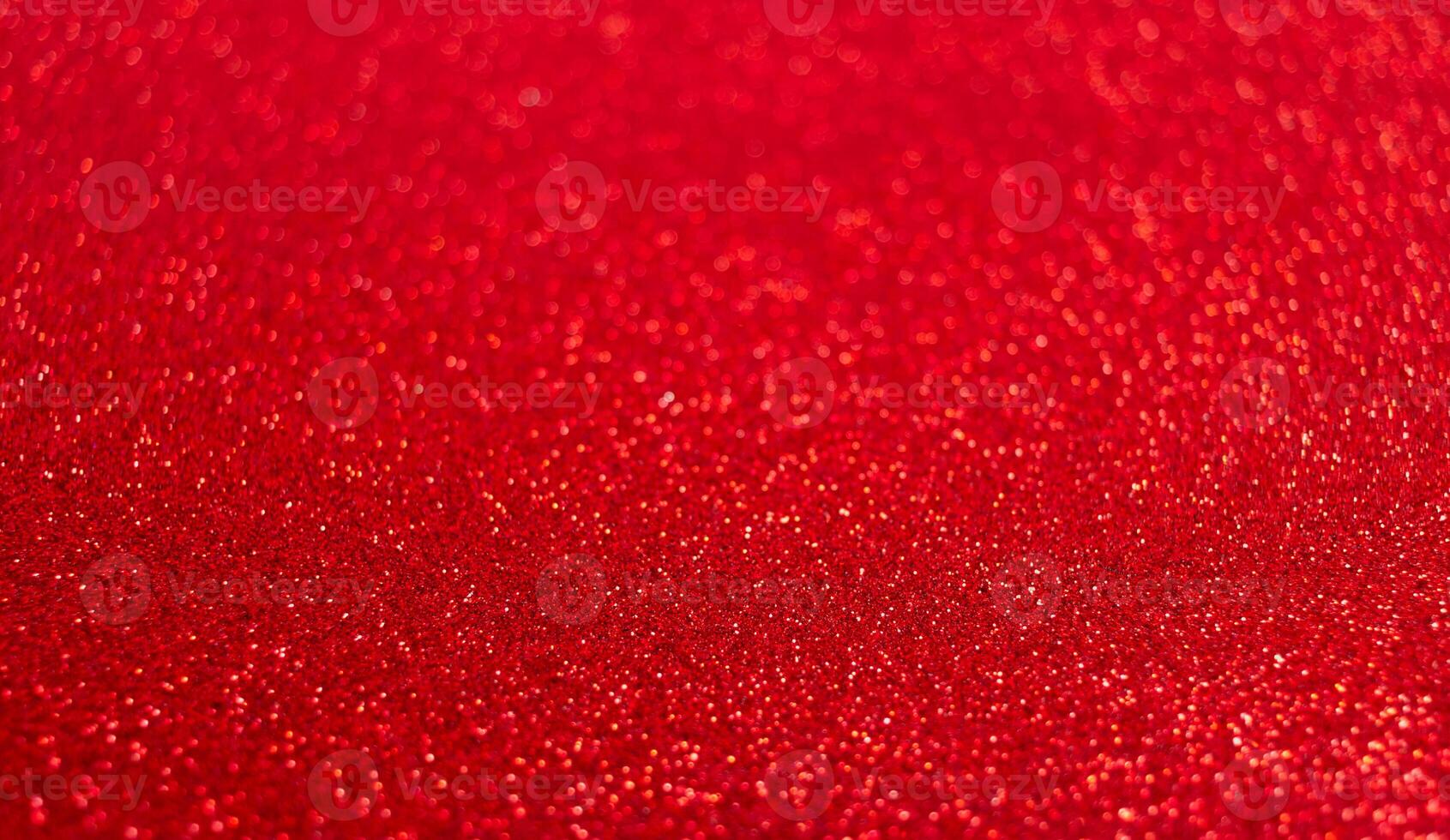 Red festive Christmas background. Abstract shimmering bright background with bokeh defocused photo