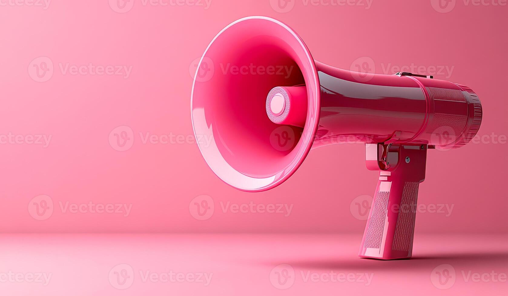 A pink microphone with a pink background. The pink color of the microphone and the background creates a fun and playful mood photo