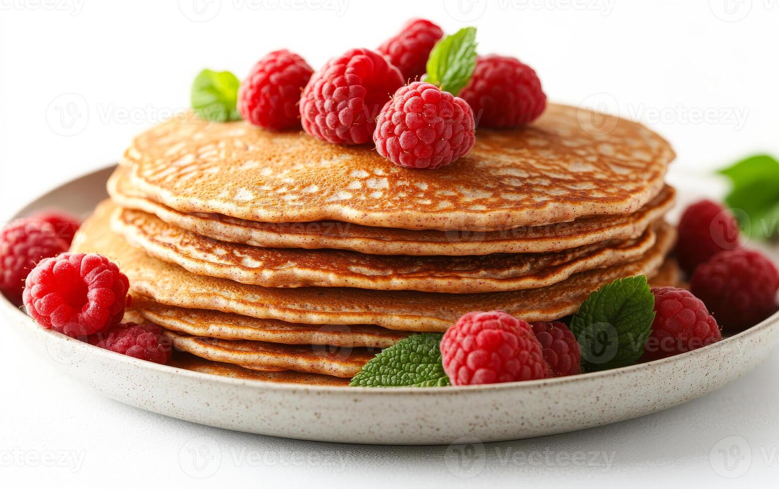 A stack of pancakes with raspberries on top. The pancakes are piled high and the raspberries are scattered around them. Concept of indulgence and satisfaction photo