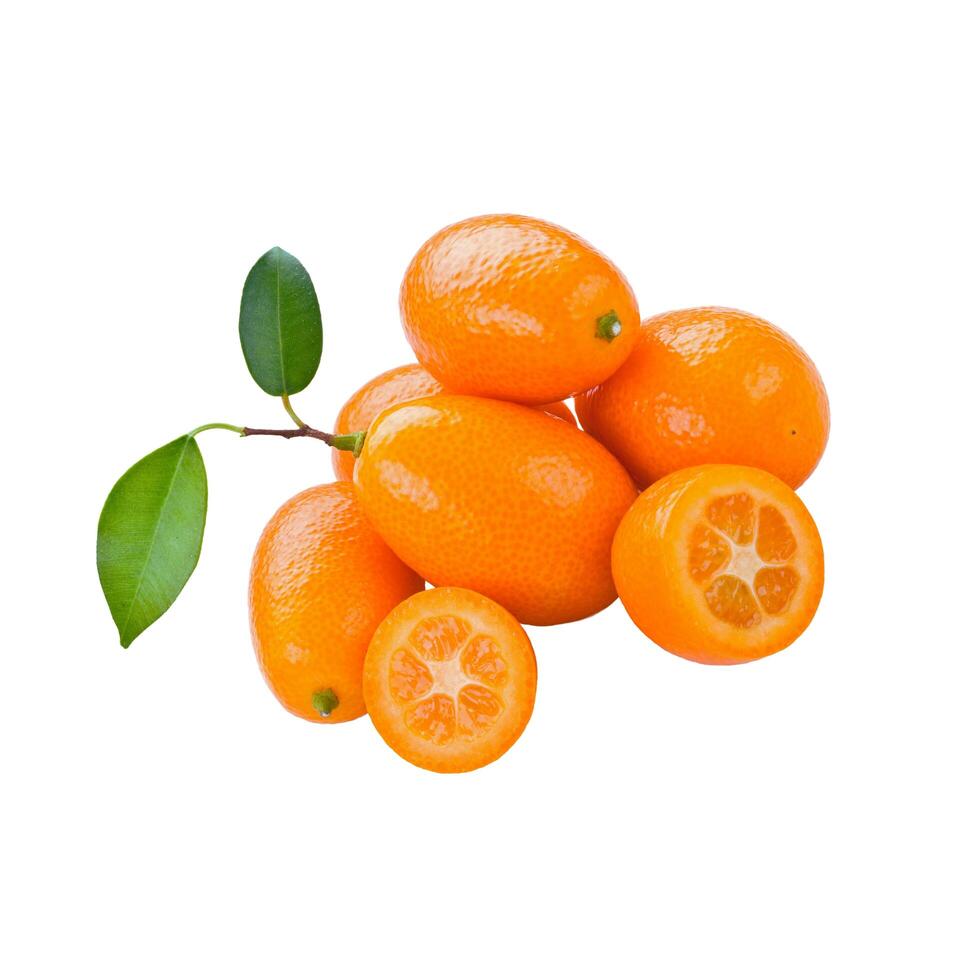 A bunch of oranges with leaves on a white surface photo