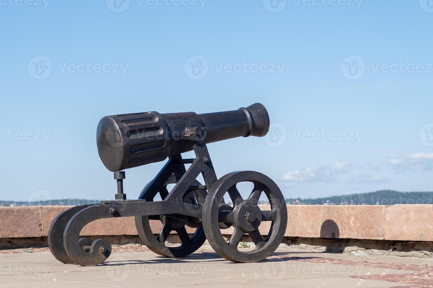 This historic cannon, crafted at the Alexander factory, overlooks the beautiful embankment of Lake Onega in Petrozavodsk, reflecting local history photo