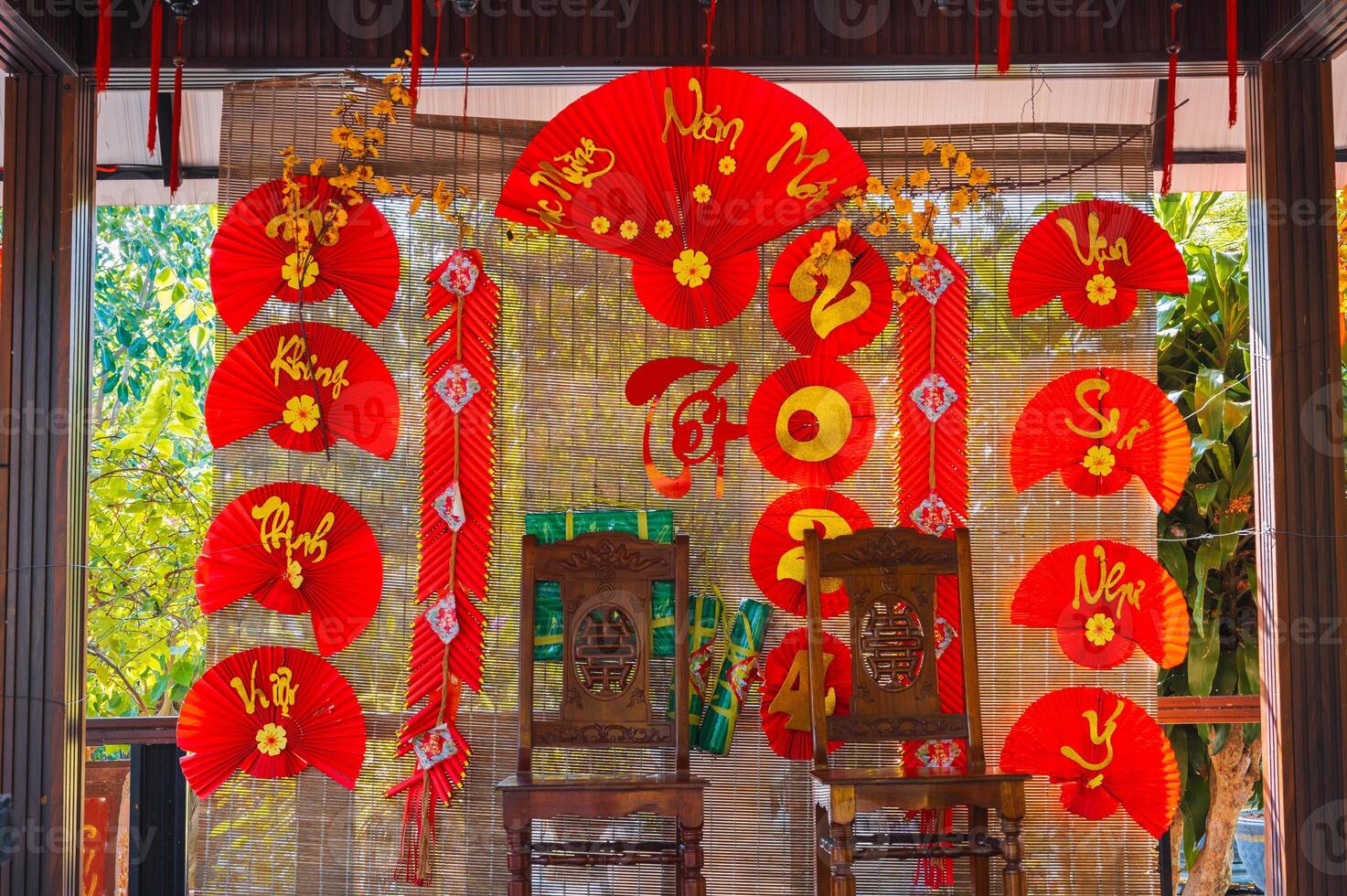Asian decor with red fans decorates the interior at Chinese New Year celebration photo