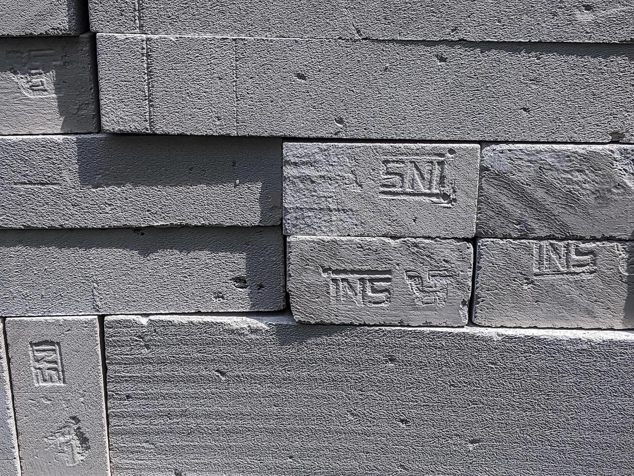 Detailed image of gray concrete blocks perfectly aligned, capturing the rugged texture and industrial feel on November 9, 2019 in Ciamis, Indonesia. photo