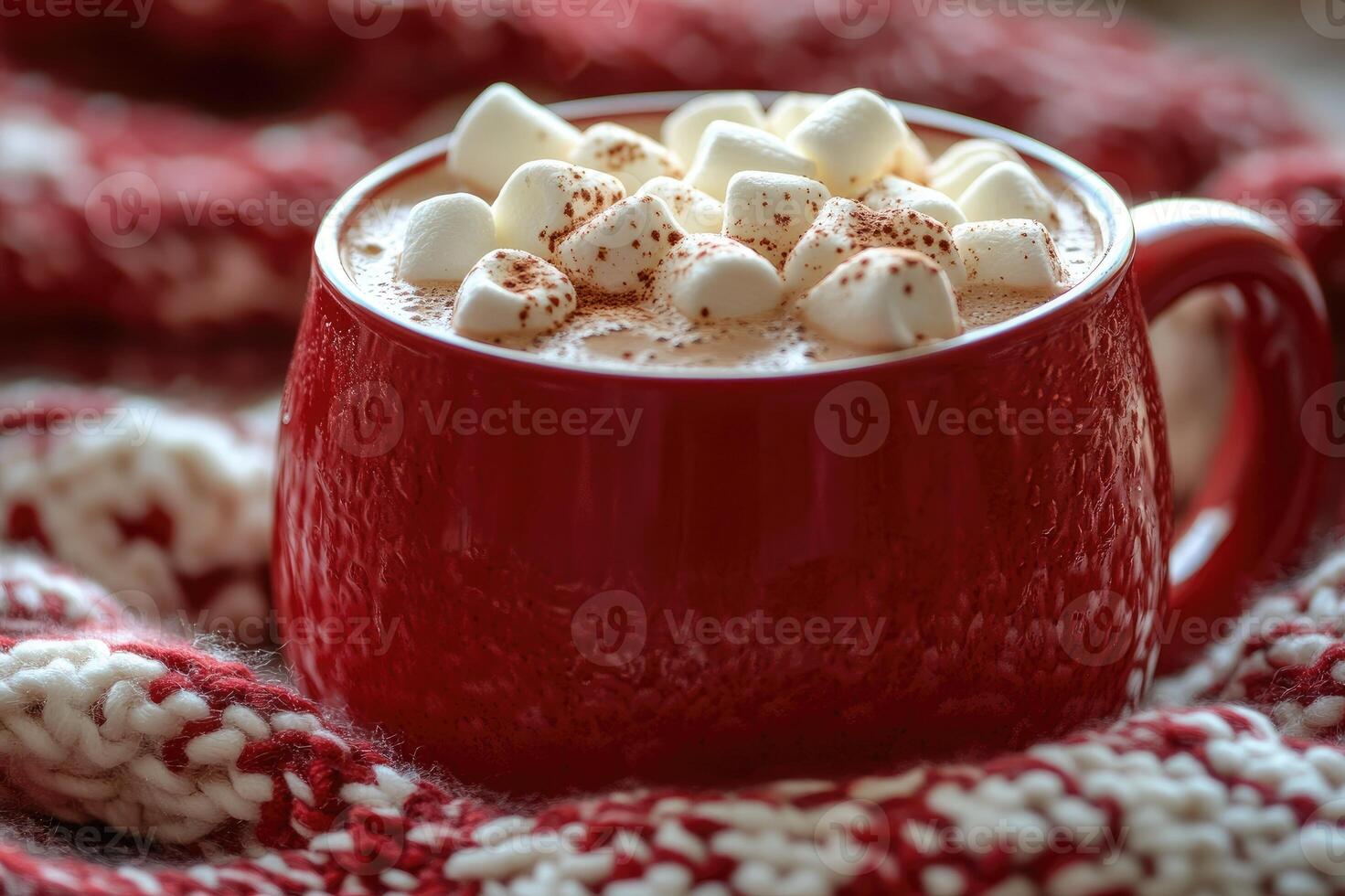 Steaming hot chocolate topped with marshmallows and cinnamon creates a cozy winter scene photo