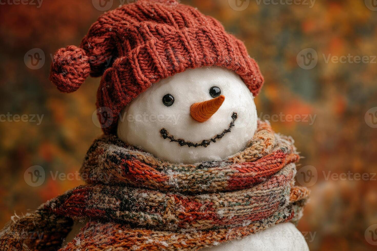 Snowman wearing hat and scarf enjoying winter snowfall photo