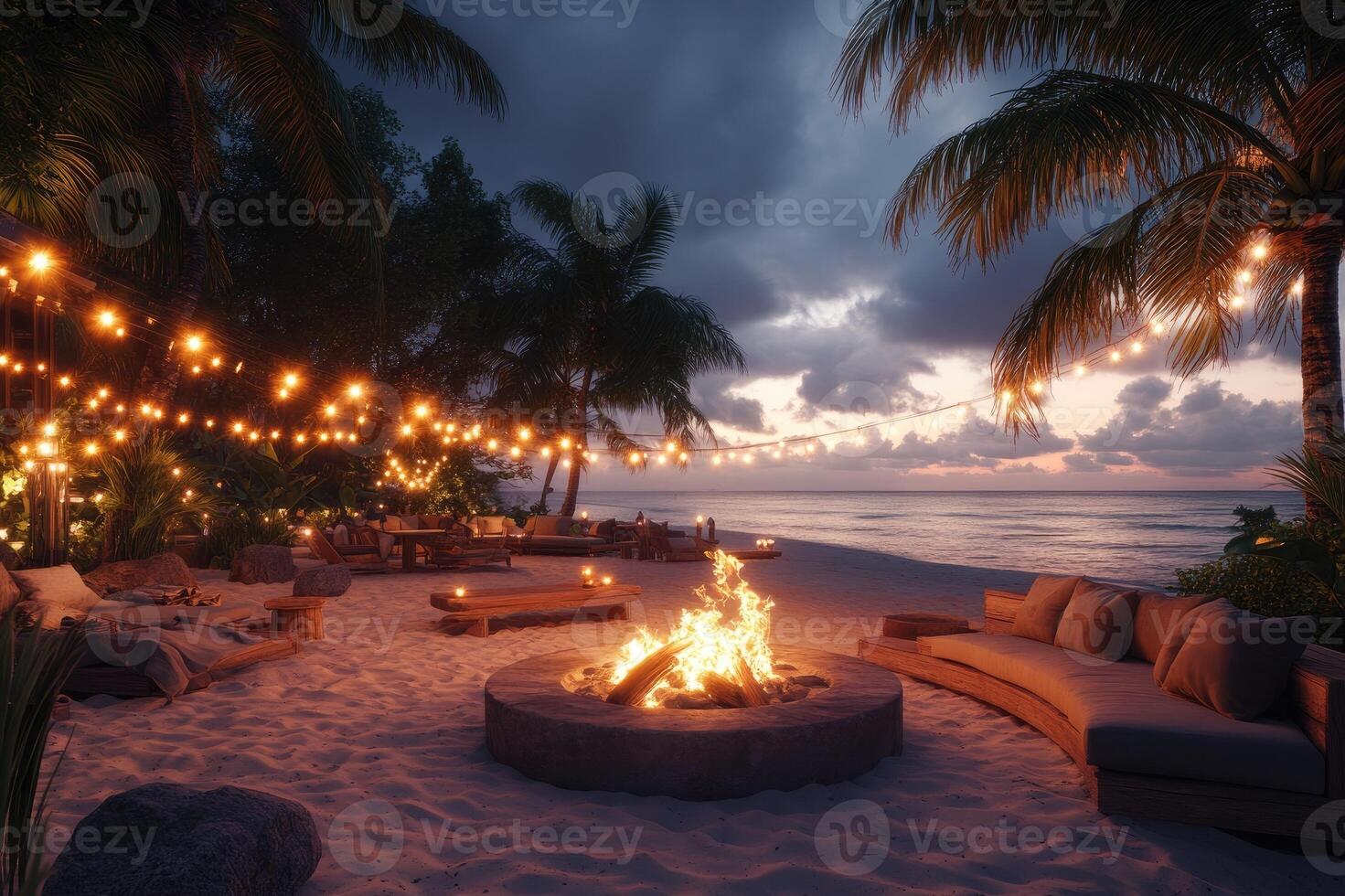 Bonfire burning on idyllic tropical beach at sunset with string lights photo
