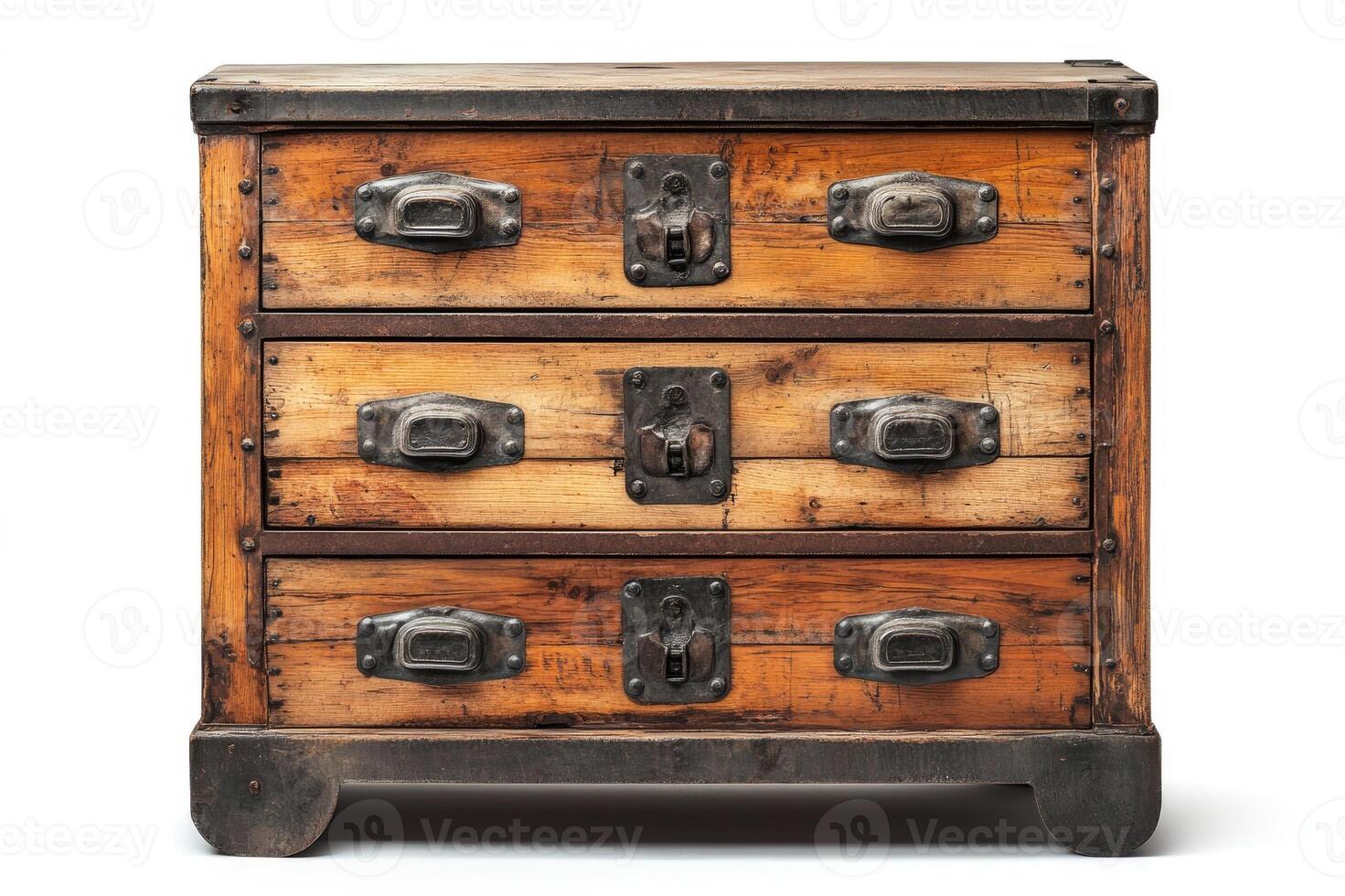 Old wooden chest of drawers with metal details isolated on white background photo